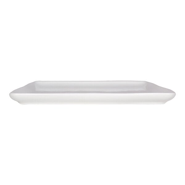 A white, square-shaped porcelain plate with slightly raised edges, shown from a side view.