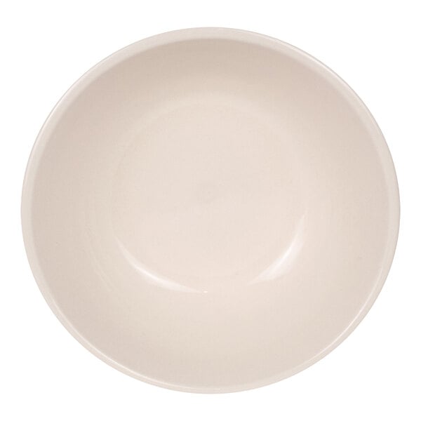A plain, round, off-white bowl viewed from above.