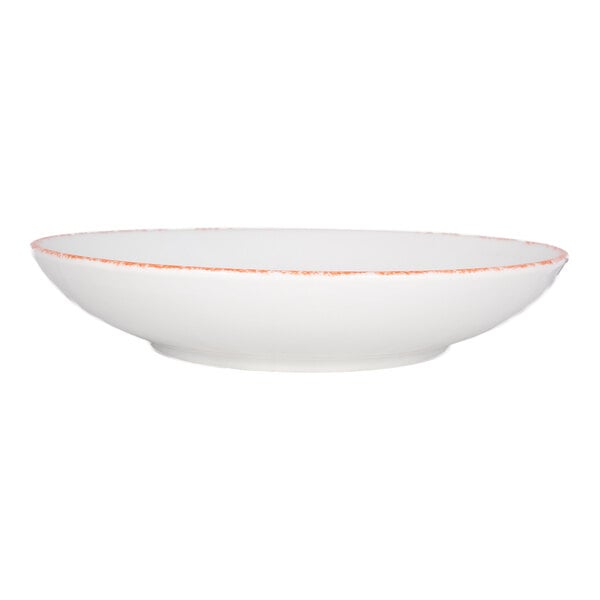 International Tableware Provincial 22 oz. White Porcelain Bowl with Sponged Red Rim - 12/Case