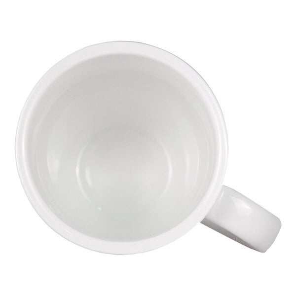 A top-down view of a plain white ceramic mug with a handle visible on the right side.