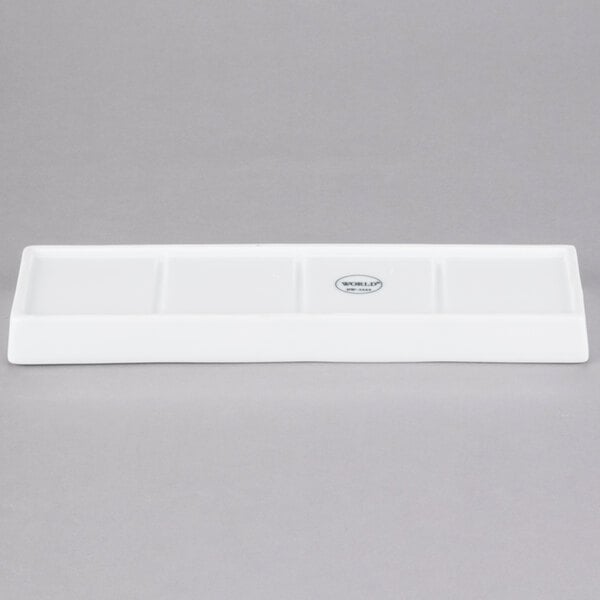Libbey Chef's Selection II 10 5/8" x 3 1/4" Ultra Bright White Porcelain 4-Well Tray - Sample