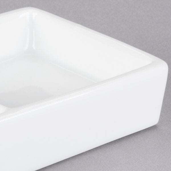 Libbey Chef's Selection II 10 5/8" x 3 1/4" Ultra Bright White Porcelain 4-Well Tray - Sample