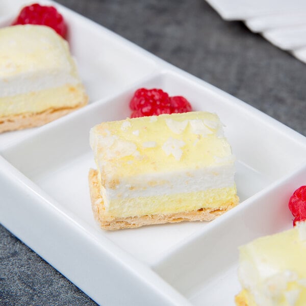 Libbey Chef's Selection II 10 5/8" x 3 1/4" Ultra Bright White Porcelain 4-Well Tray - Sample