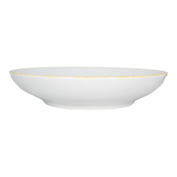 International Tableware Provincial 22 oz. White Porcelain Bowl with Sponged Yellow Rim - 12/Case