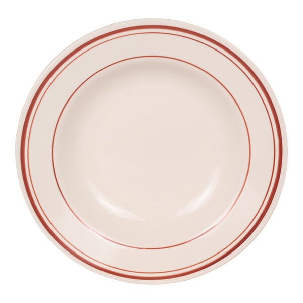 A round, white bowl with two red bands near the rim.