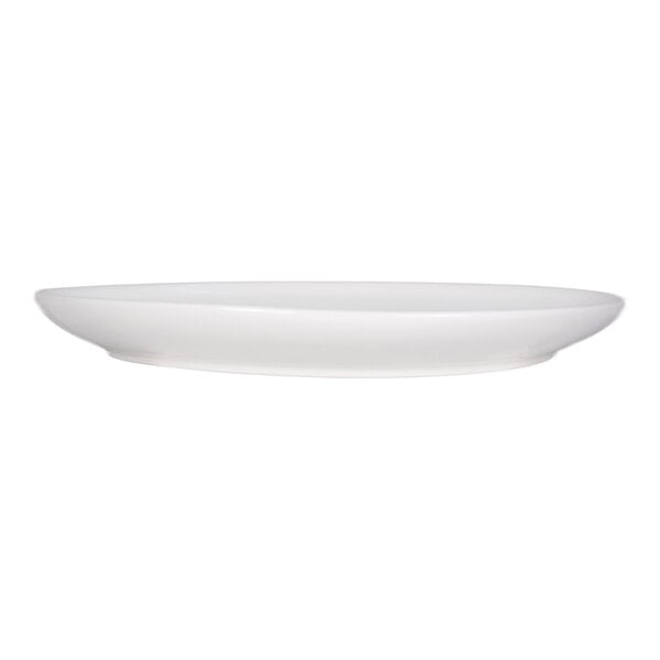 A plain, white, oval-shaped platter with a smooth surface and slightly raised edges.