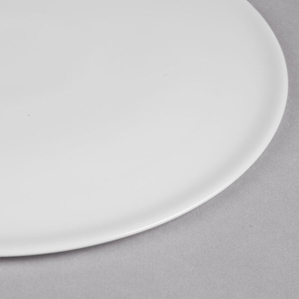 Libbey Chef's Selection 10 1/2" Aluma White Porcelain Round Tray - Sample