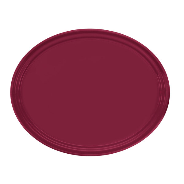 A red oval Cambro tray with a white background.