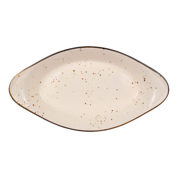 An oval-shaped, cream-colored dish with brown speckles and a slightly raised rim.