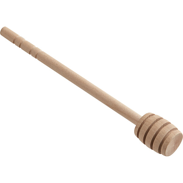 A wooden honey dipper with a grooved head and a long handle.