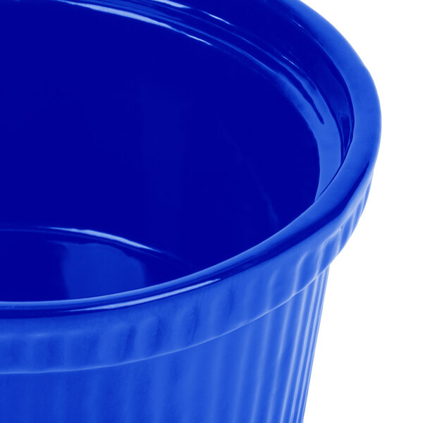 A Tablecraft cobalt blue cast aluminum souffle bowl.