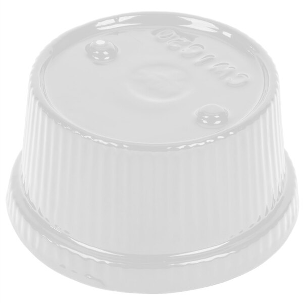 A white cast aluminum Tablecraft souffle bowl with ridges.