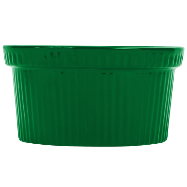 A green cast aluminum souffle bowl with ridges.