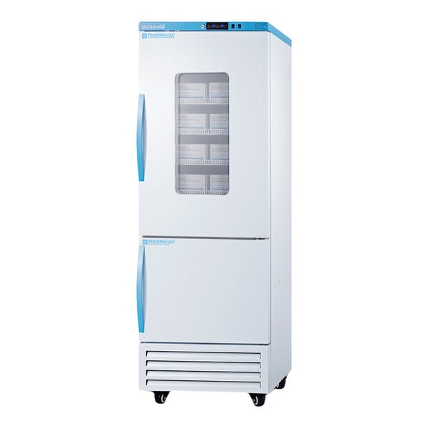 A tall, white and blue refrigerator/freezer unit with two doors, the upper door featuring a window showing interior shelves, and the lower door being solid.