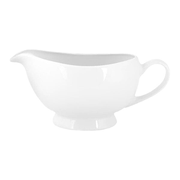 A white porcelain sauce boat with a handle and spout, shown against a plain background.