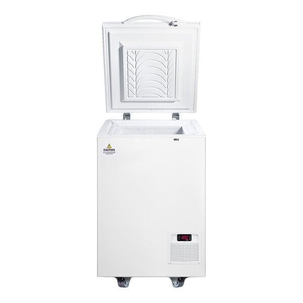 A white chest freezer with an open lid, digital temperature display, and caster wheels.