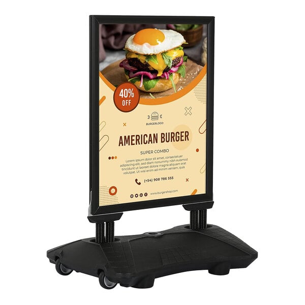 A freestanding black sign board with a weighted base on wheels, displaying an advertisement for an American burger combo with a 40% off offer.
