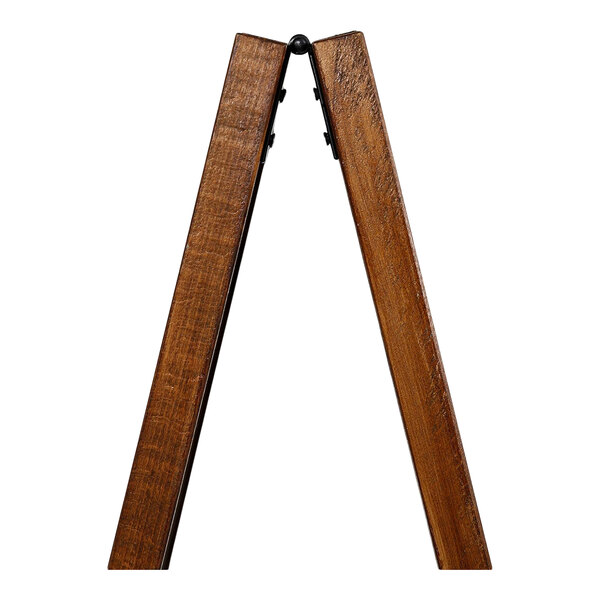 A partial view of a wooden A-frame structure with a dark finish, showing the top hinge and two angled legs.
