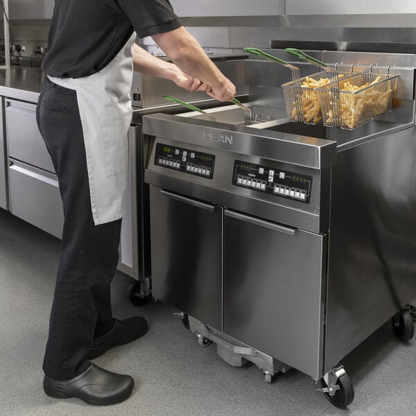 Dean by Frymaster PowerRunner 2FPRG50T Natural Gas Floor Fryer with (2) 50 lb. Fry pots, CM3.5 Controller, and Built-In Filtration - 240,000 BTU