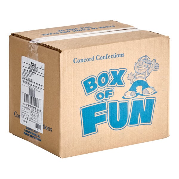 A cardboard box labeled 'Box of Fun' with blue text and a cartoon character, sealed with tape and a shipping label on the side.