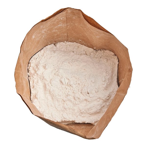 An open brown paper bag filled with white flour, viewed from above.