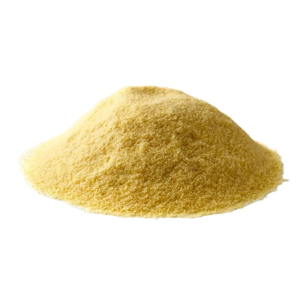 A mound of fine, yellowish powder on a white background.