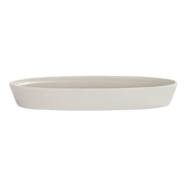 A simple, oval-shaped, ivory-colored platter with slightly raised edges.