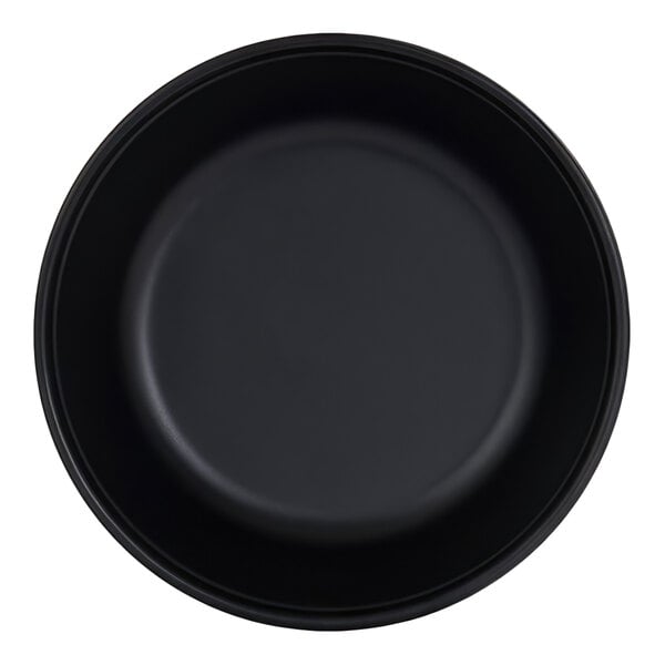 A black, round bowl with smooth sides and a matte finish, viewed from above.