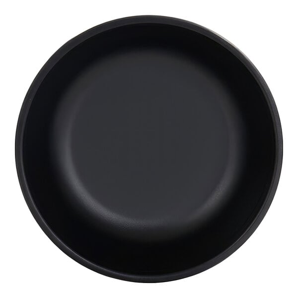 A black, round bowl with smooth sides and a matte finish, viewed from above.