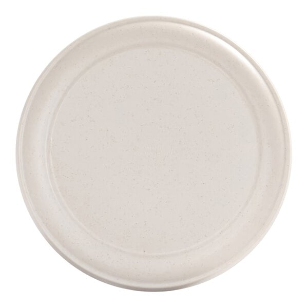 A round, ivory-colored plate with a subtle speckled pattern and a raised rim.