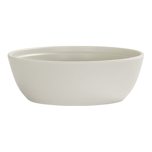 A plain, round, ivory-colored bowl with smooth sides and a slightly flared rim.