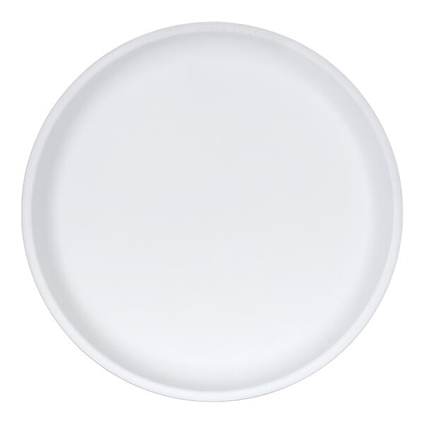 A plain white round plate with a slightly raised rim, viewed from above.