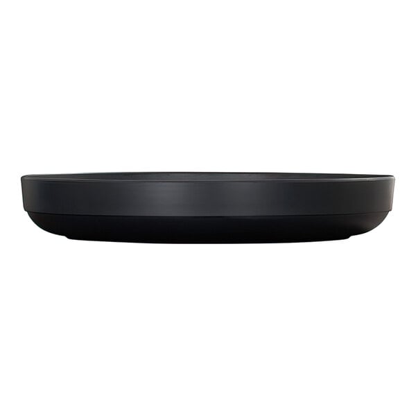A black, round platter with a raised rim, shown from a side view against a white background.