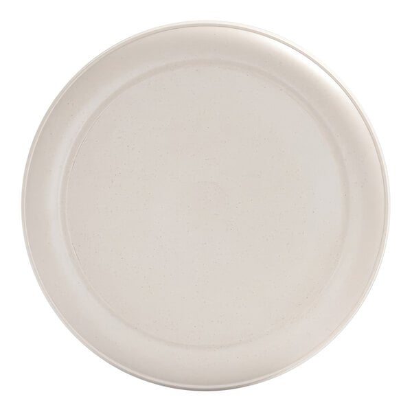 A round, ivory-colored plate with a subtle speckled pattern and a raised rim.