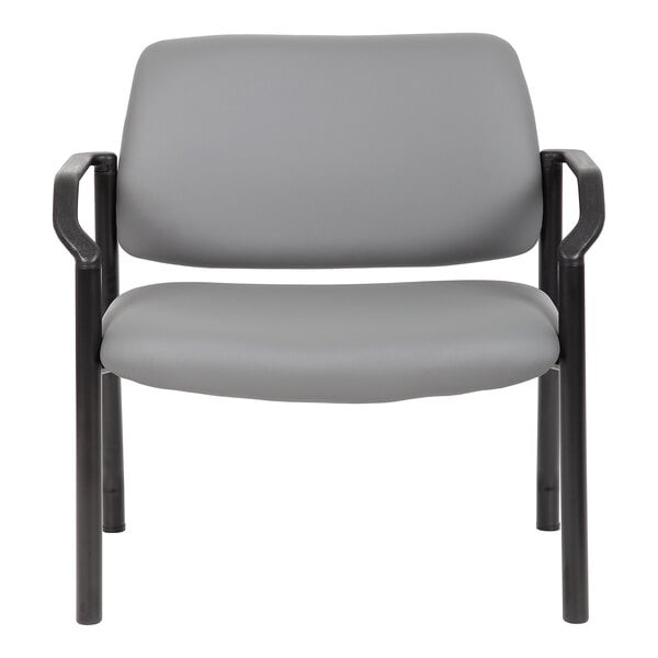 A gray chair with a cushioned seat and backrest, black armrests, and four straight legs.