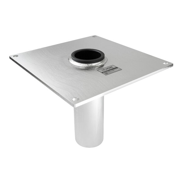 A metallic square plate with a central circular opening and a cylindrical tube extending downward from the middle.