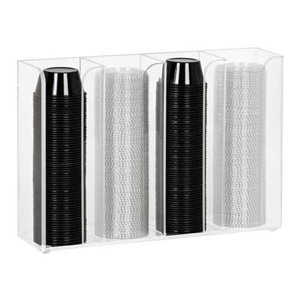 A clear acrylic organizer with four vertical sections, each holding a stack of black or clear plastic cups.