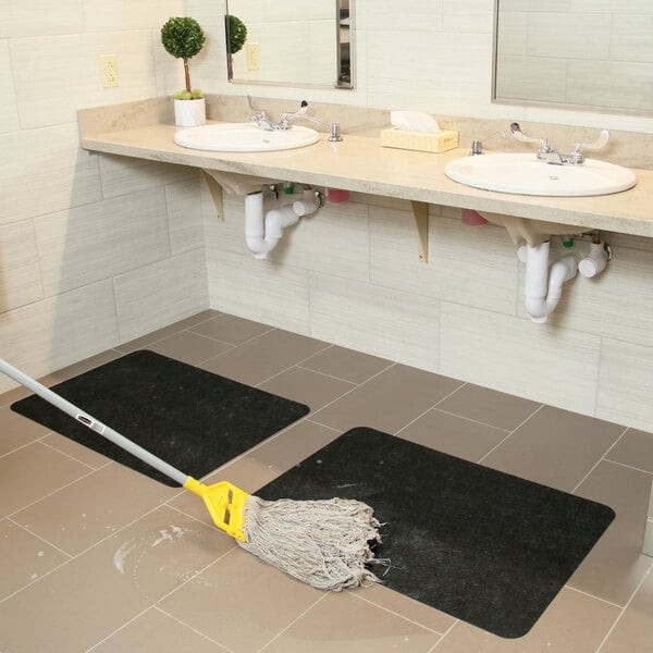 New Pig Grippy GRP7007-BK 2' x 2 15/16' Black Antimicrobial Sink / Dryer Mat with Adhesive Backing - 4/Case