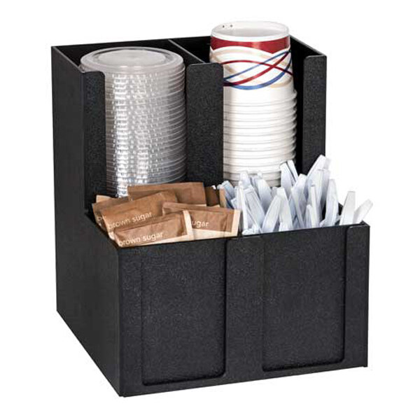A black organizer with four sections holding plastic lids, paper cups, sugar packets, and wrapped straws.