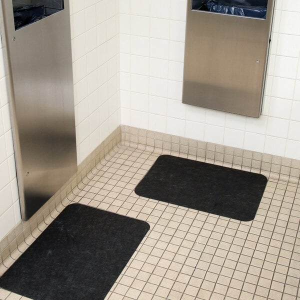 New Pig Grippy GRP7006-BK 1 7/16' x 2' Black Antimicrobial Sink / Dryer Mat with Adhesive Backing - 4/Case