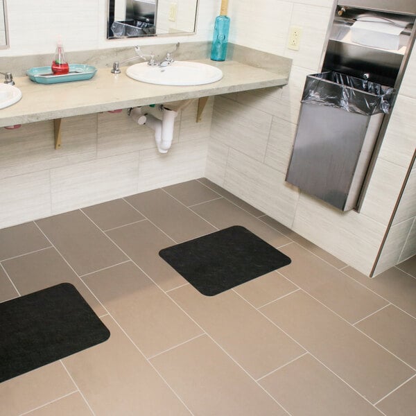New Pig Grippy GRP7006-BK 1 7/16' x 2' Black Antimicrobial Sink / Dryer Mat with Adhesive Backing - 4/Case