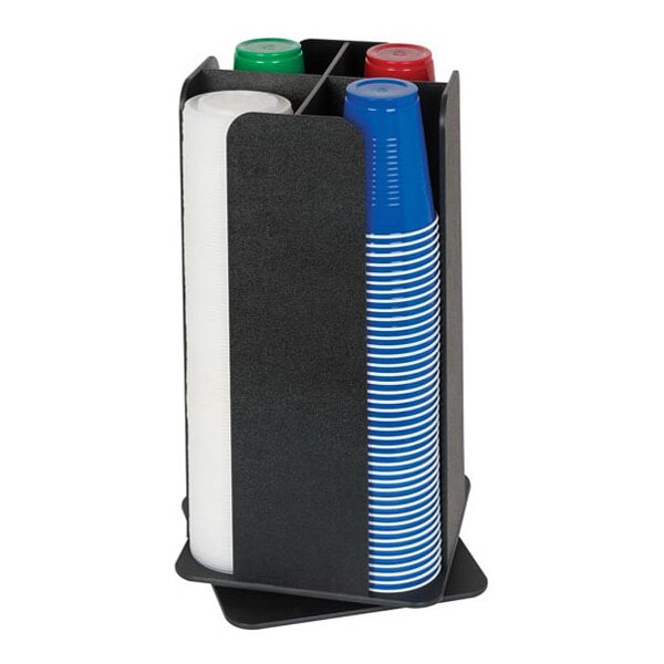 A black, four-section revolving countertop organizer holding stacks of plastic cups and lids in various colors.