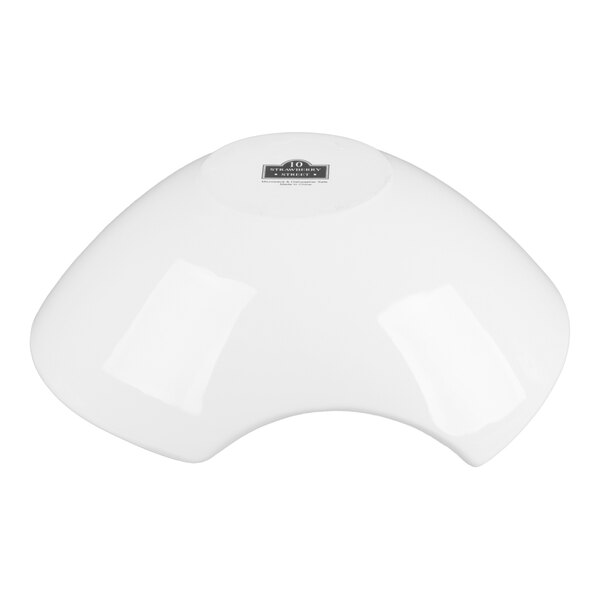 A white porcelain samurai bowl with a unique curved shape.