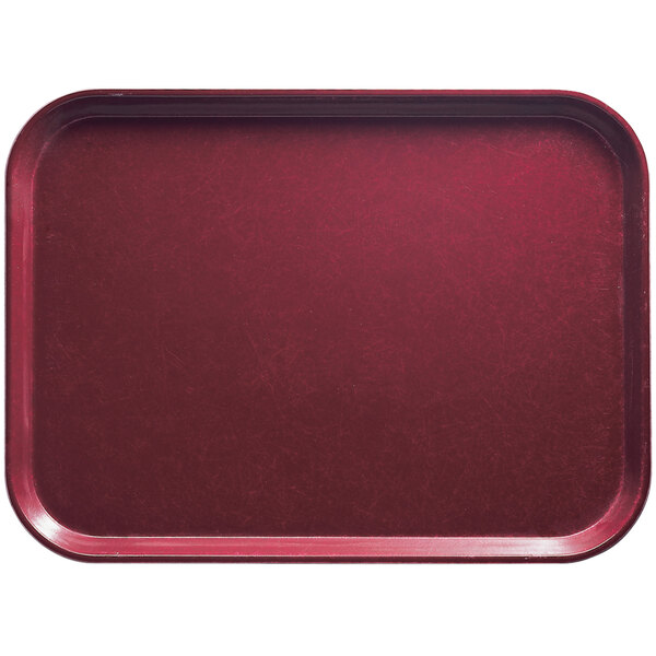 A red rectangular Cambro tray with a white background.