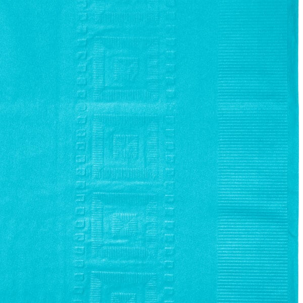 A Bermuda blue paper table cover with a square design on it.