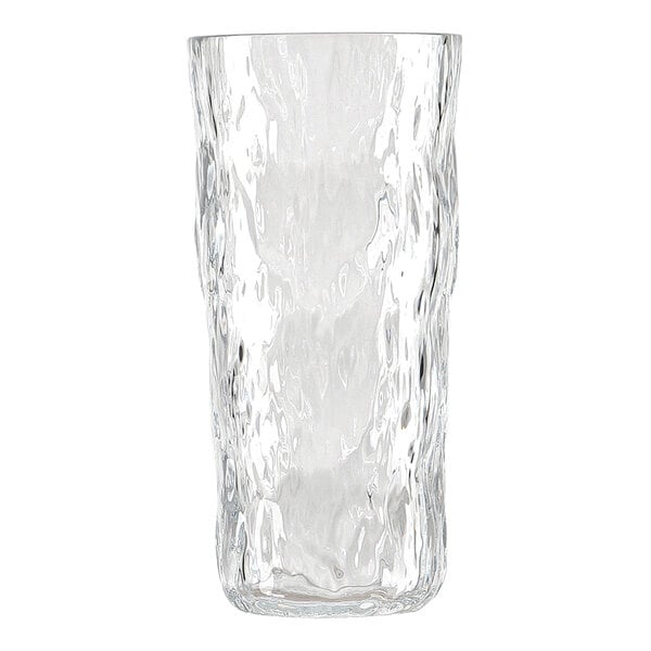 A clear, tall drinking glass with a textured, wavy surface.