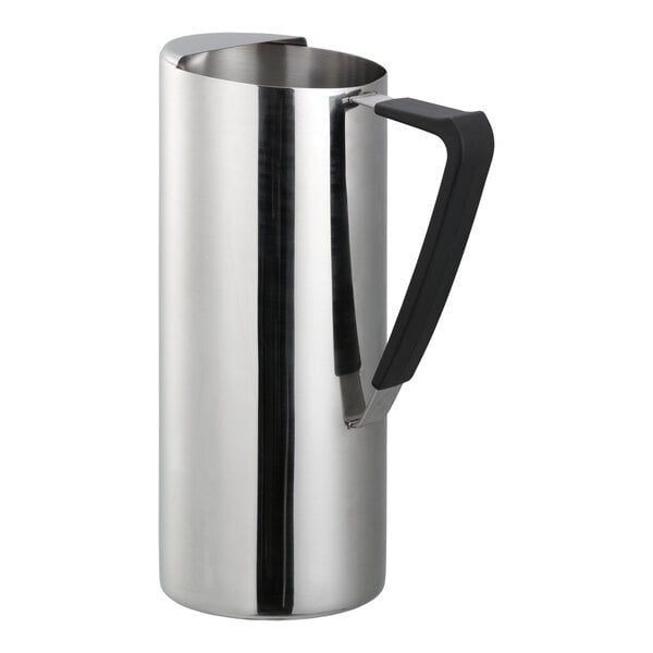 A tall, cylindrical polished stainless steel pitcher with a black handle and a spout guard.