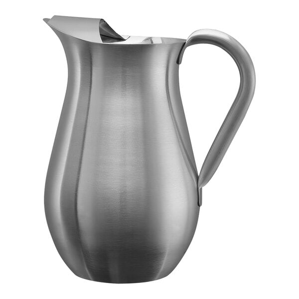 A brushed stainless steel pitcher with a curved handle and a spout guard.