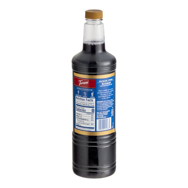A clear plastic bottle filled with a dark liquid, featuring a gold cap and a blue label with nutritional information and product details.