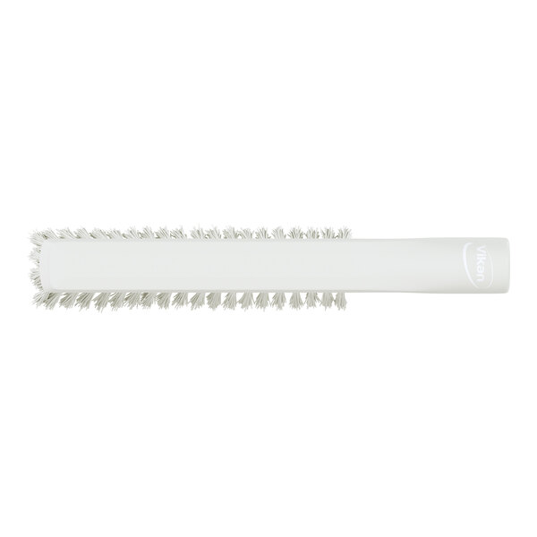 A white cylindrical brush with bristles arranged around the handle and a threaded end.